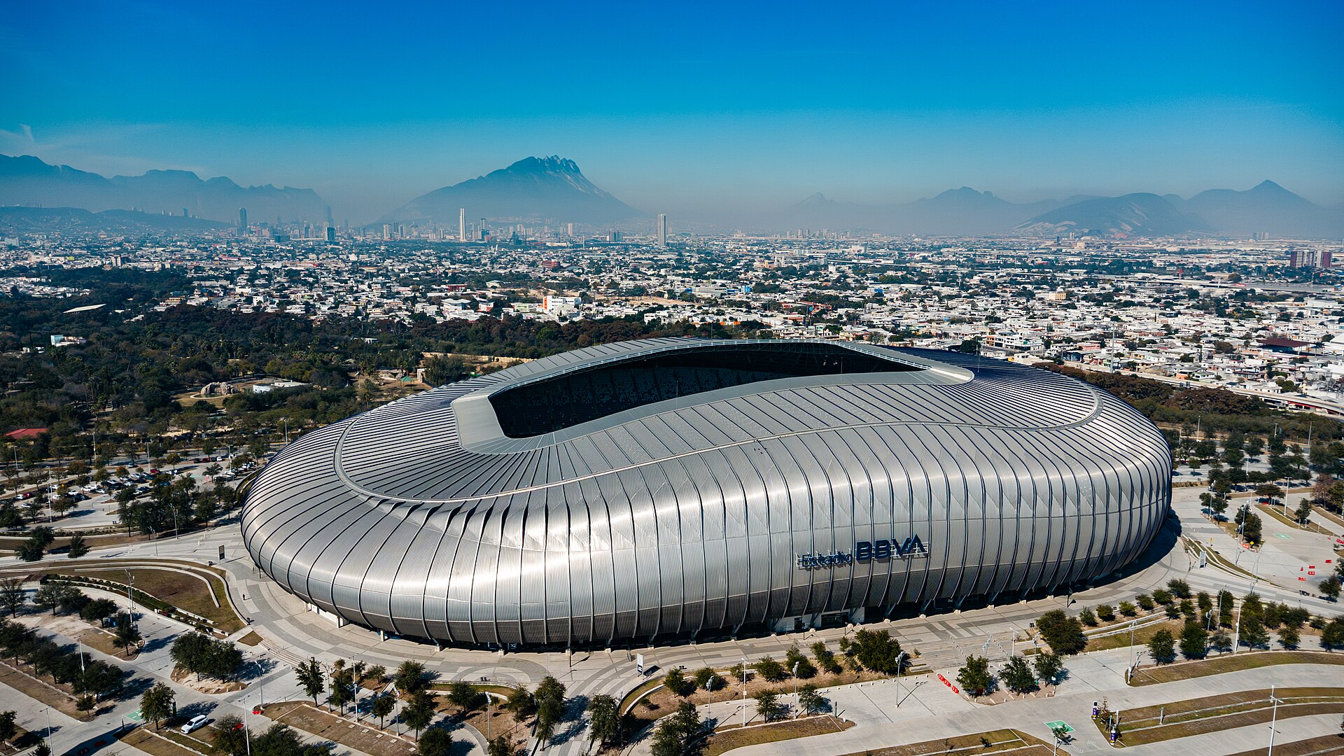 Estadio Monterrey and the Steel Giant beneath the mountain